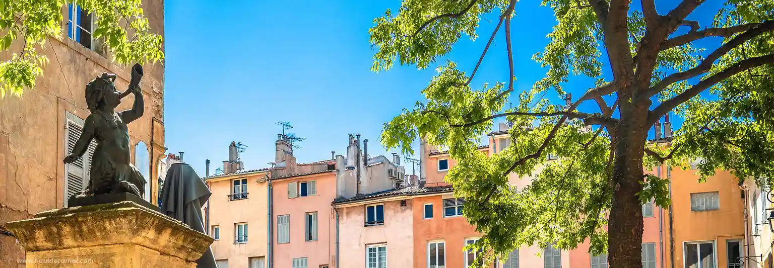 A cosy fountain square with a city view