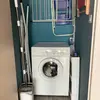 The storage space you will find laundry machine, detergent, cleaning products, vacuum cleaner, iron, iron board, spare light bulbs and hangers for coats